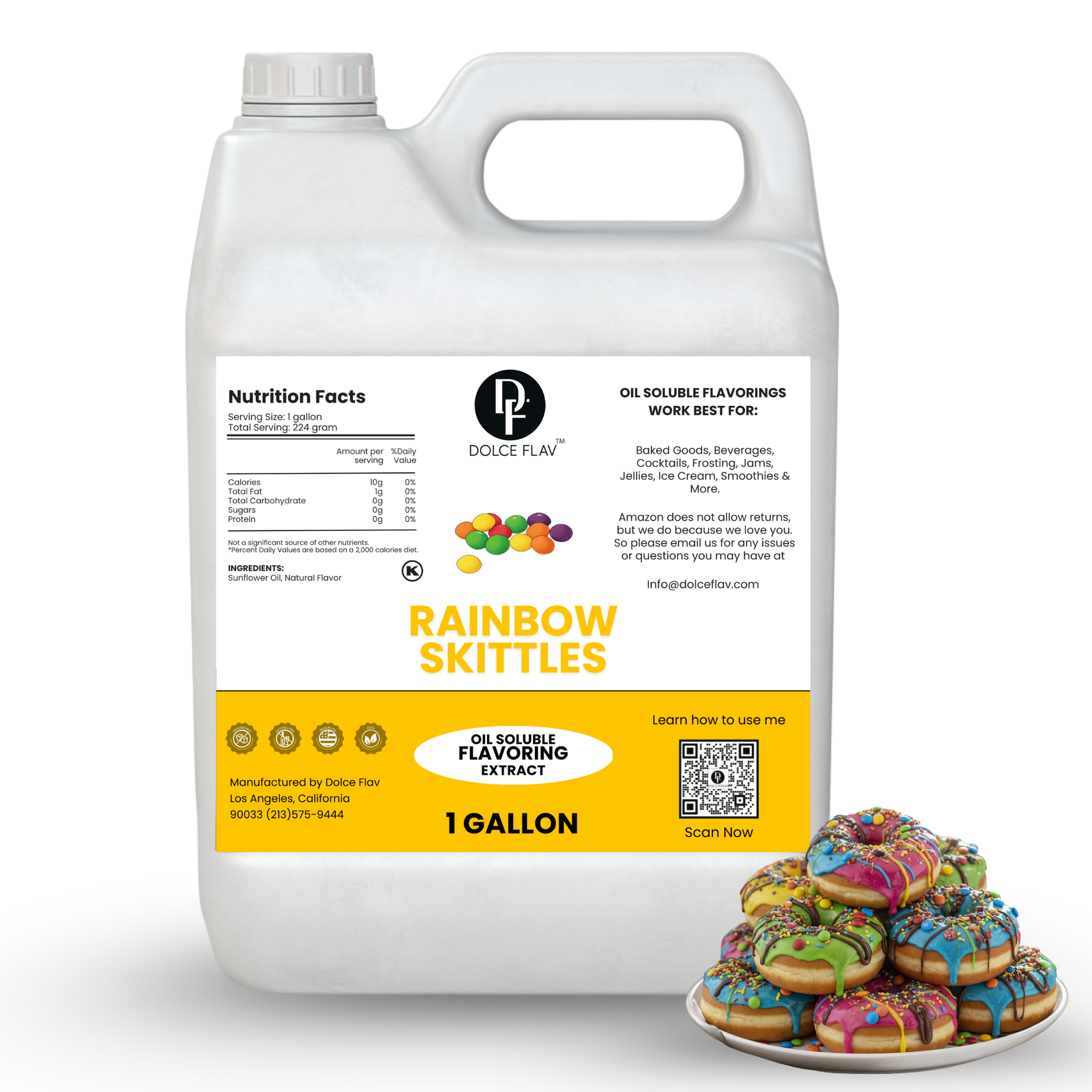 Gallon container of rainbow skittles flavor extract with a plate of colorful donuts on a white background