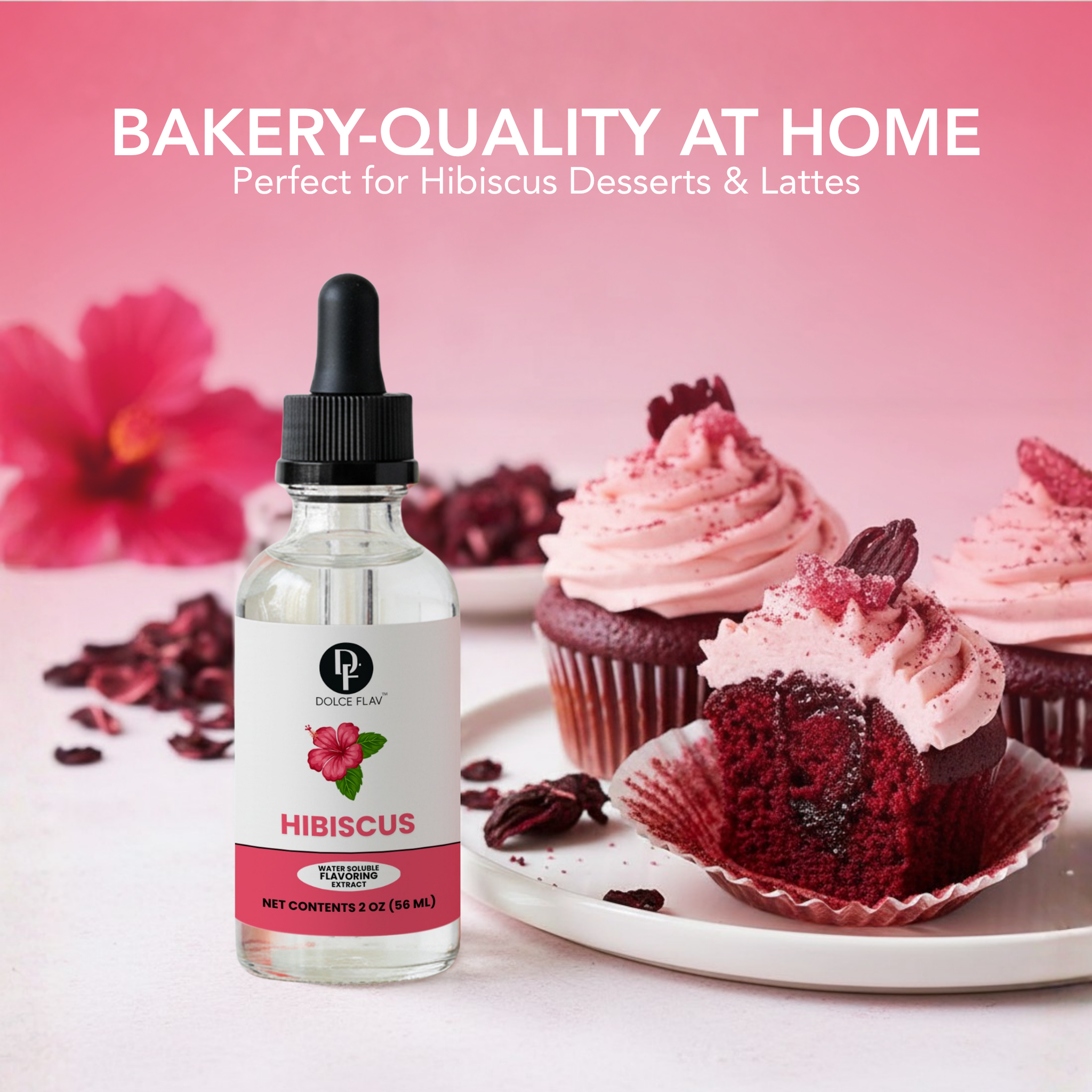 Bottle of hibiscus syrup with cupcakes on a pink background