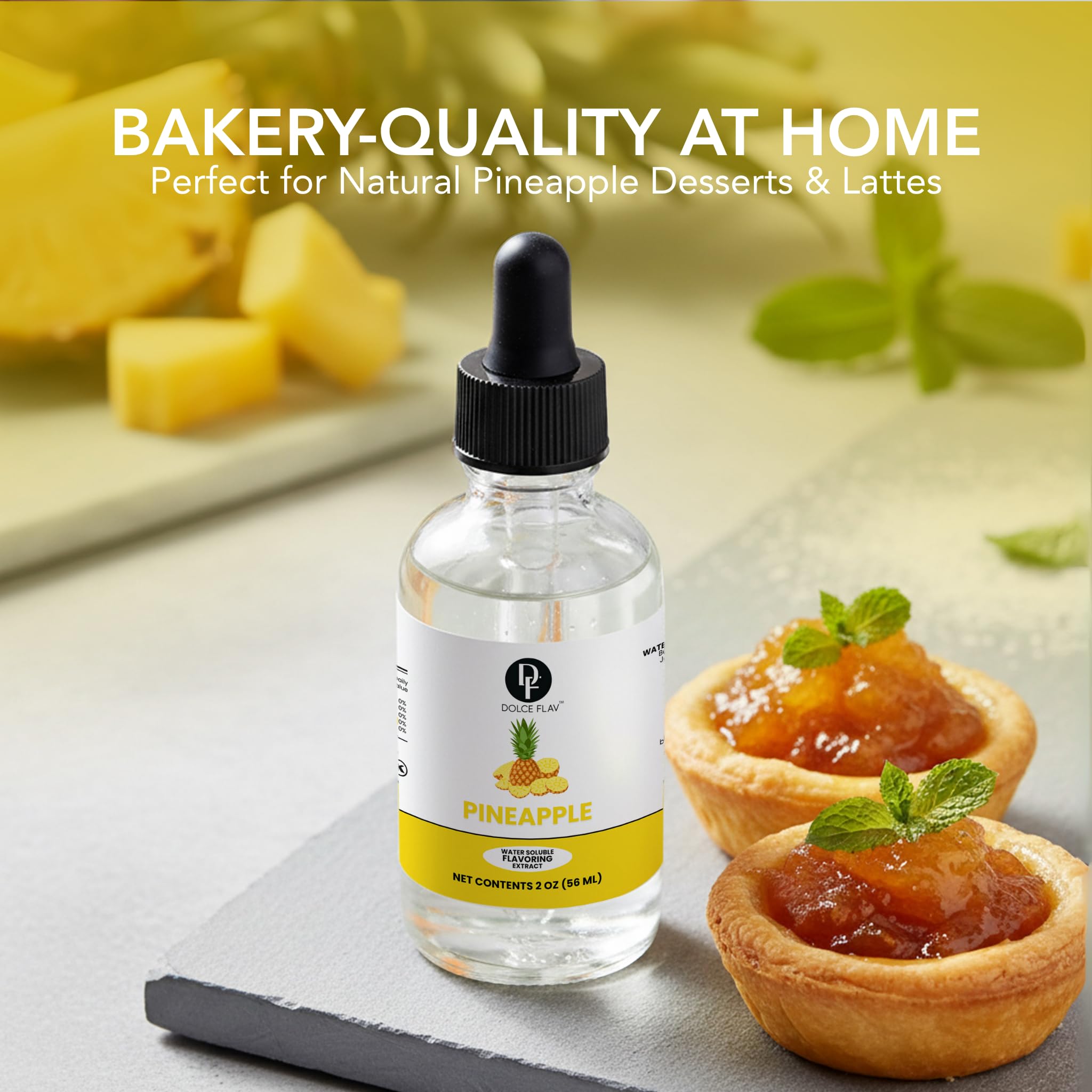 Bottle of pineapple syrup with pineapple desserts on a table