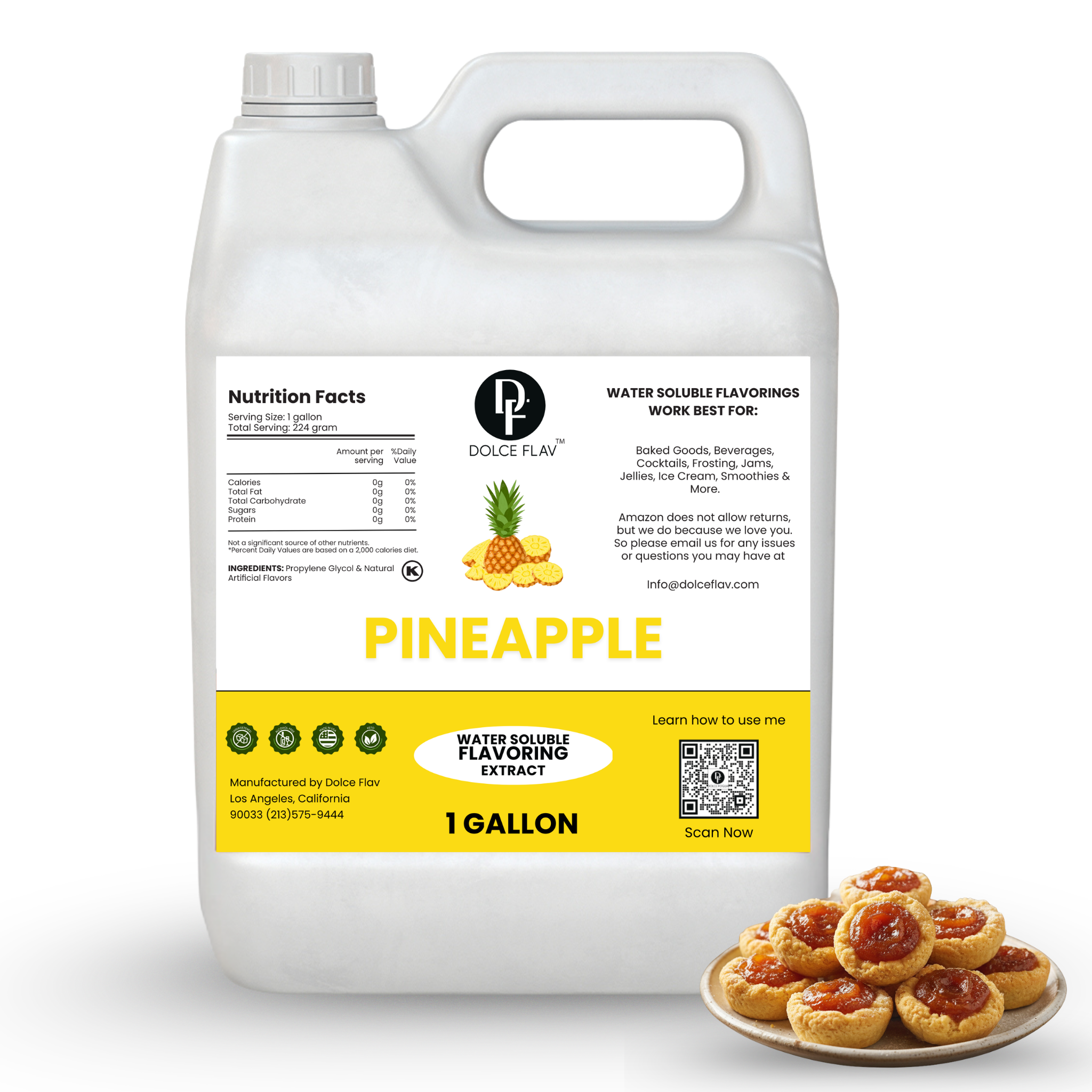 Pineapple flavoring extract container with a plate of pineapple cookies on a white background